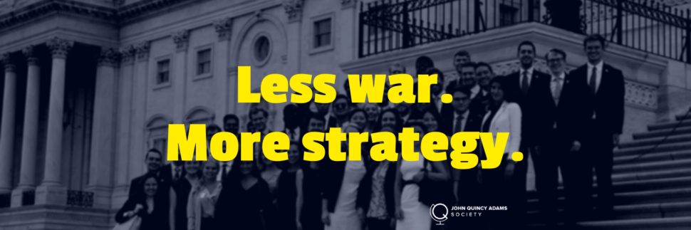 A photo of program participants at Capitol Hill with the words "Less War. More Strategy."